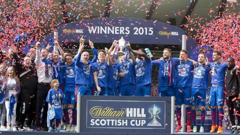 The Inverness Caledonian Thistle squad celebrate their Scottish Cup victory over Falkirk at Hampden Park on Saturday Picture: PA 
