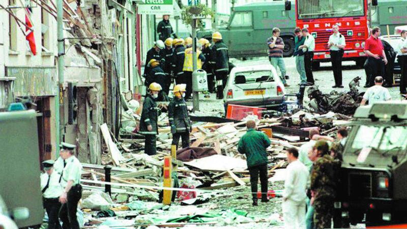 Rescue workers and police search for survivors following the Omagh bombing 