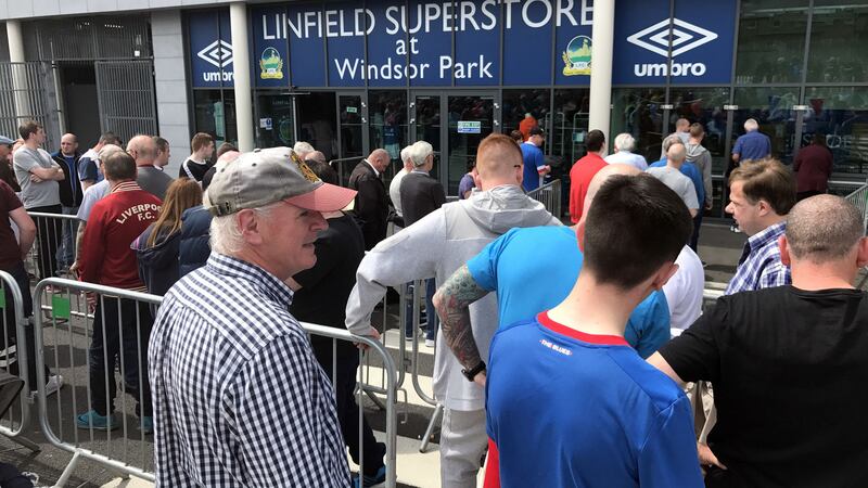 Linfield fans queue outside Windsor Park, Belfast for tickets for next week's Champions League qualifier clash with Celtic&nbsp;&nbsp;