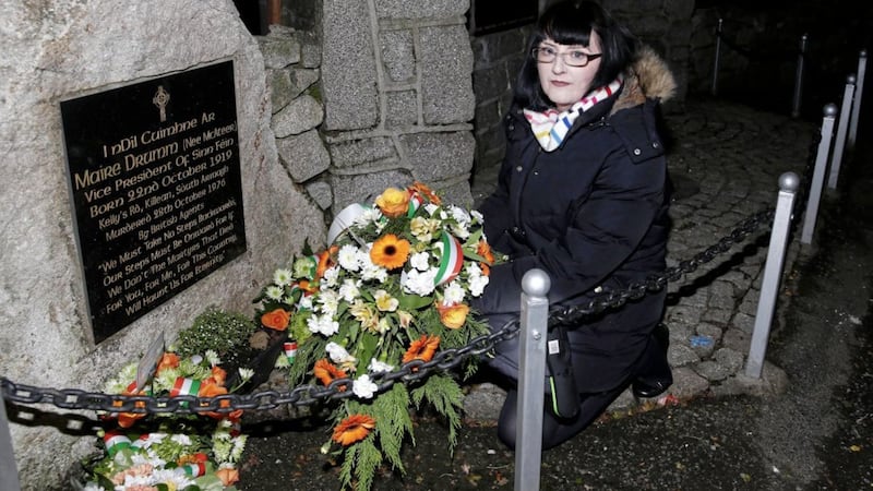 Roisin Drumm lays a wreath at the Monument to her late Grandmother on the Centenary of her birth. Pic Philip Walsh 
