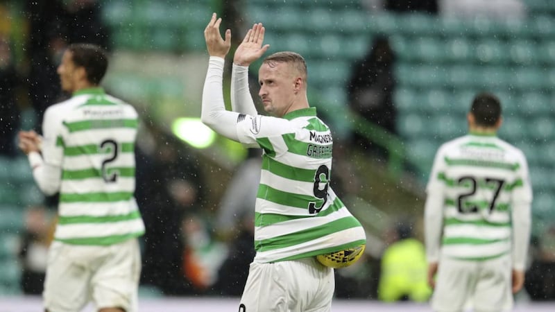 Celtic&#39;s Leigh Griffiths keeps the match ball safely trucked away after scoring a hat-trick against St Johnstone in the Ladbrokes Scottish Premiership clash at Celtic Park, Glasgow on Saturday March 7, 2020. Picture by Andrew Milligan/PA Wire. 