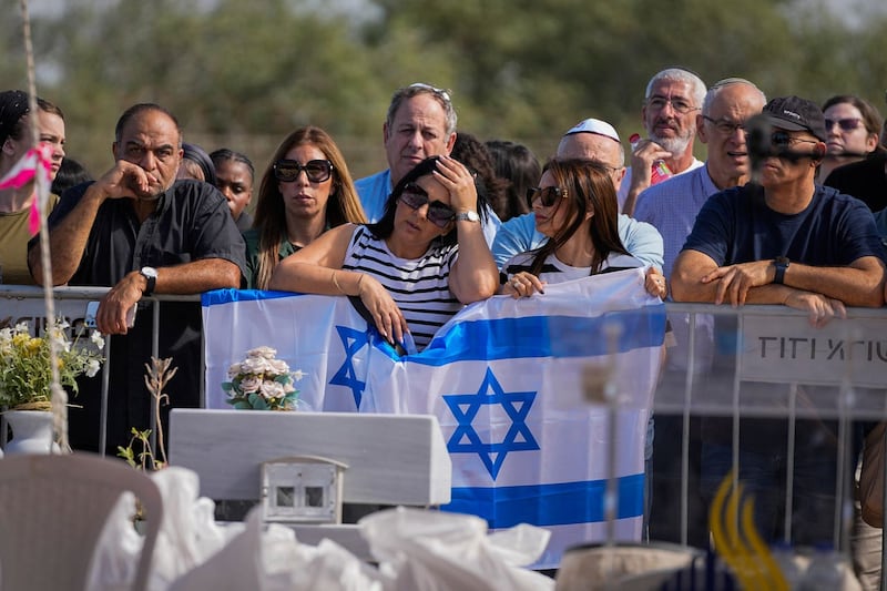 Mourners at the funeral of the Kotz family in Israel 