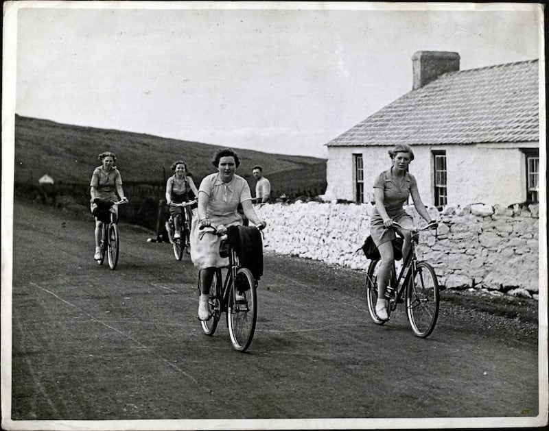 Girls cycling around Groomsport in Co Down  