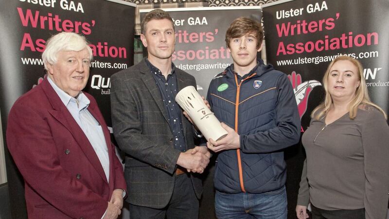 Joe McManus (UGAAWA), Mark Lunney (Quinn Building Contracts area sales manager for Armagh, Fermanagh and Monaghan), March UGAAWA Merit Award winner Andrew Murnin and Armagh PRO Claire Shields 