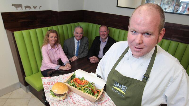 Head Chef Shaun Hanna with co-owner John Robinson of Linen Hill Kitchen with UCI Chief Executive, Harry McDaid 