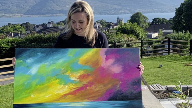 Artist Jacqueline Rooney with the painting for Jay Blades 