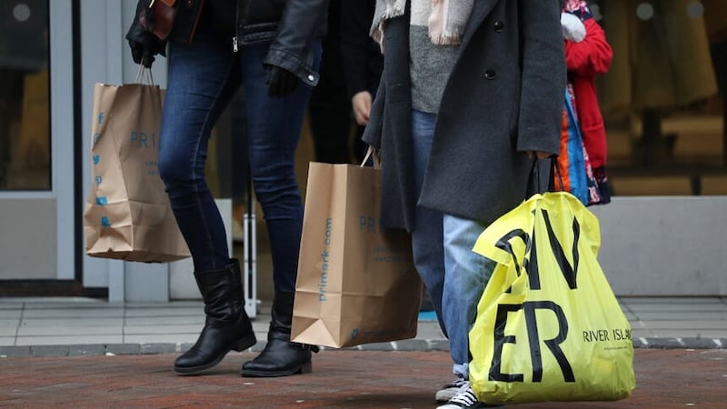 Consumer confidence in the year ahead is continuing to recover despite persistent cost-of-living pressures, a survey suggests (PA)