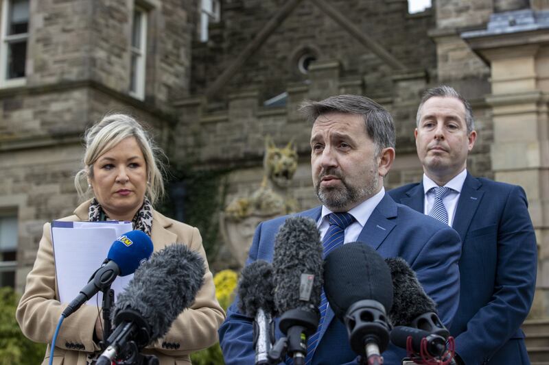 Northern Ireland Minister of Health Robin Swann (centre) speaks during a press conference at Stormont Castle in 2021, as he gave an update from the Northern Ireland Executive on new Covid measures as then deputy First Minister Michelle O’Neill (left) and then First Minister Paul Givan (right) look on