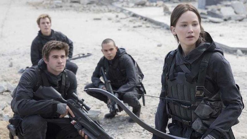 Liam Hemsworth, front left, and Jennifer Lawrence in The Hunger Games: MockingJay &ndash; Part 2 