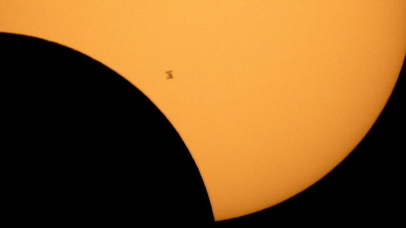 The space station crossed the path of the eclipse three times.