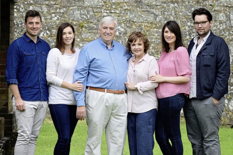 Dana and her husband Damien Scallon with their children, from left, John James, Grace, Ruth and Rob