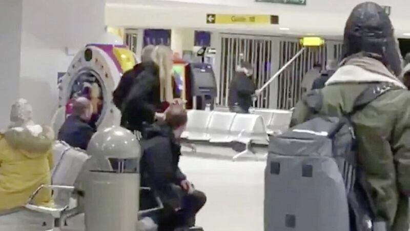 Belfast International Airport said there was an altercation in the departures area between two groups of passengers 