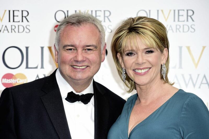 Eamonn Holmes and Ruth Langsford before she found out those deliveries were Tayto crisps, not things for the dog 