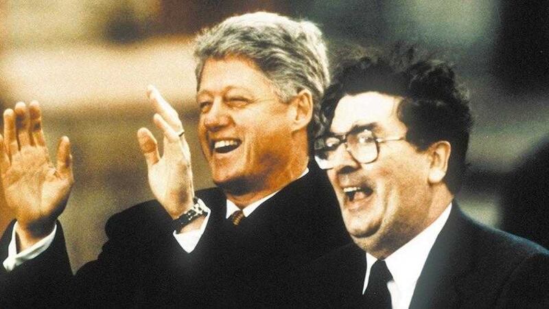 US President Bill Clinton pictured in Derry with MP John Hume during his visit to the north in December 1995 