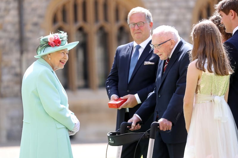 The Queen chatted with Sir Tom and his family 