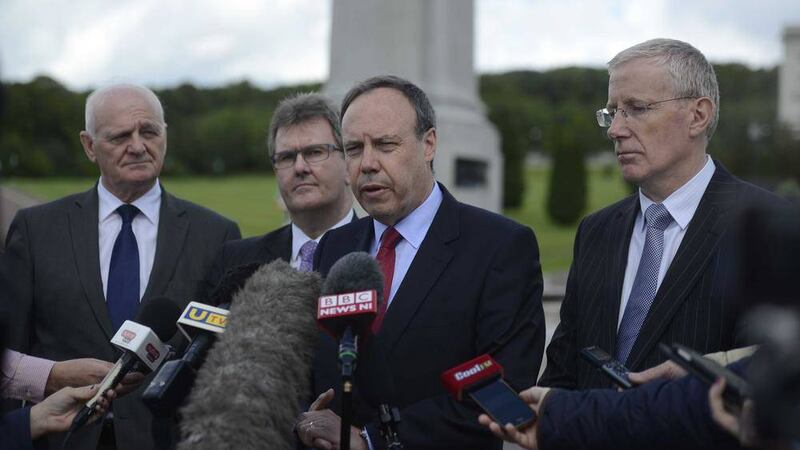 A DUP delegation led by Nigel Dodds speaks to the media after meeting with Theresa Villiers Pic Colm Lenaghan/Pacemaker. 