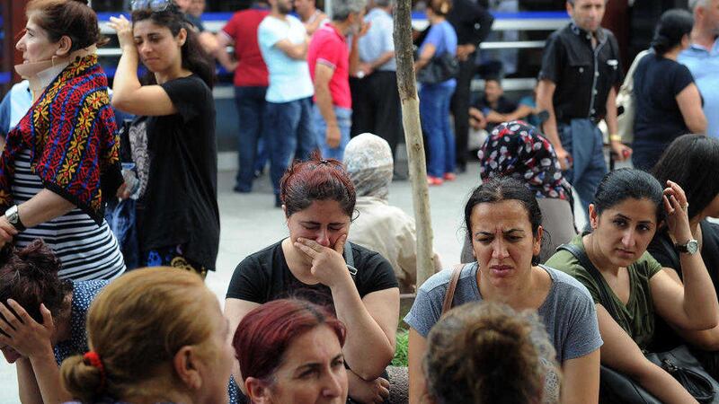 Family members of victims outside Bakirkoy State Hospital in Istanbul on Wednesday. Picture by Omer Kuscu 