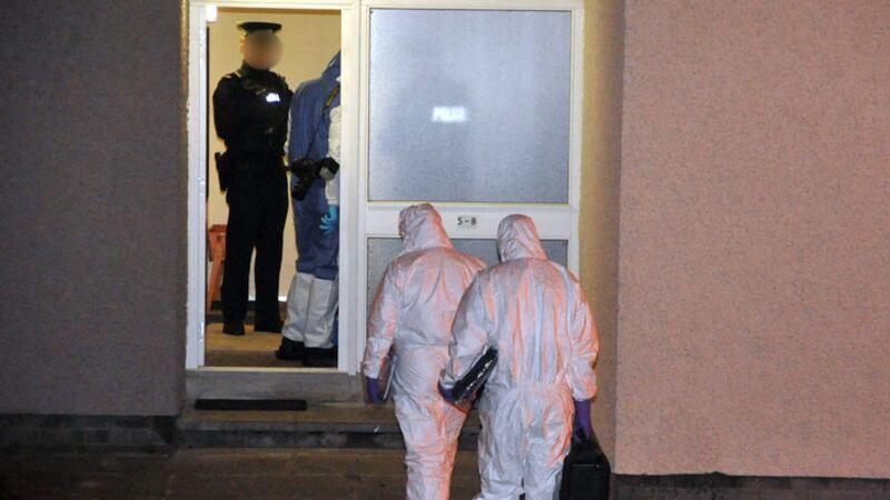 Police and forensic experts at the house in Devenagh Court in Ballymena. Picture by Pacemaker<br />&nbsp;