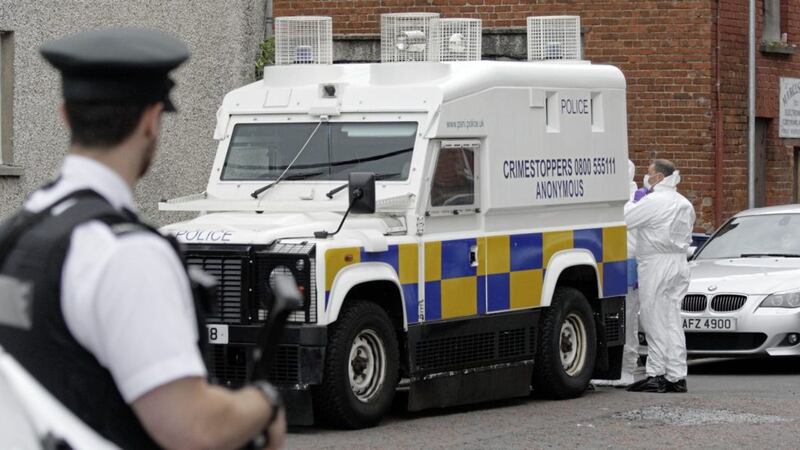 Police investigating the murder of a 45-year-old man at Victoria Street, Lurgan, Co Armagh have come under attack with petrol bombs. Picture by Cliff Donaldson. 