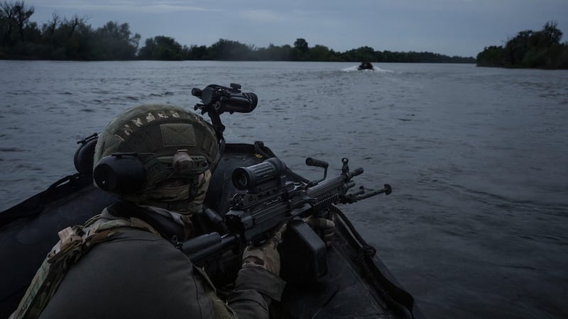 Ukrainian soldiers navigate on the Dnipro river (Felipe Dana/AP)