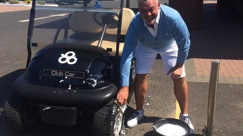 Dungannon golfer Darren Clarke may have found a new career as a cart cleaner at Royal Portrush Golf Club 