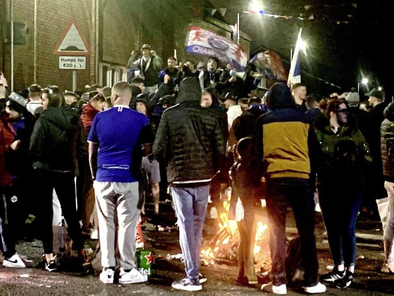 Rangers fans celebrating on the Shankill Road on Sunday evening 