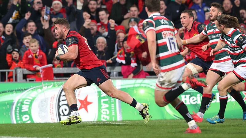 Munster's Jaco Taute on the way to scoring his side's third try during the European Champions Cup, Pool One match at Thomond Park&nbsp;