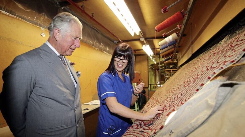 Prince Charles visiting Ulster Carpets last year on a visit to Northern Ireland. The company has reported a seven per cent rise in turnover for the year to &pound;68.4 million. Picture by Andrew Paton/Press Eye 