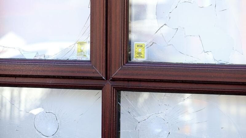 Windows smashed at a home in Alliance Close where a single mother and her four children have had to leave after receiving a &quot;warning&quot; in the post. Picture by Mal McCann. 