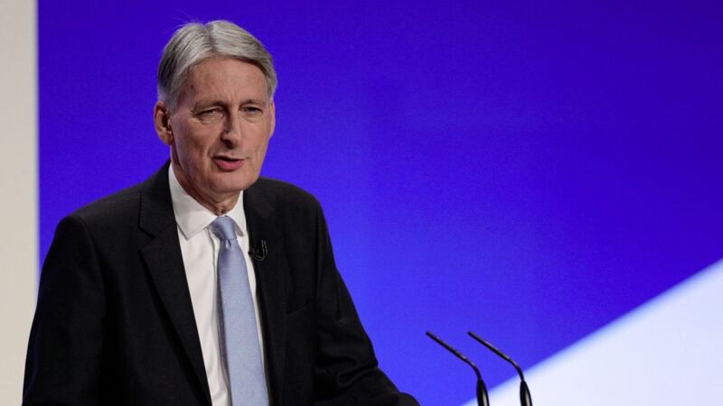 Chancellor Philip Hammond has been boosted by a fall in UK Government borrowing 