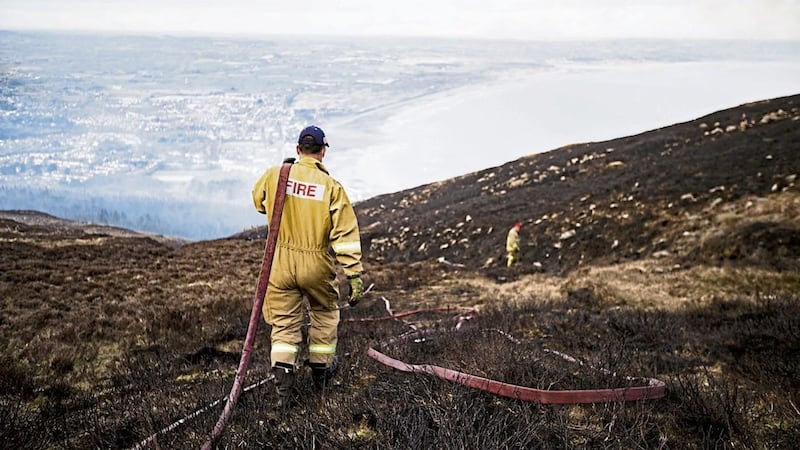 Firefighters spent days battling a large gorse fire in the Mournes. Picture by Conor Kinahan, Pacemaker 