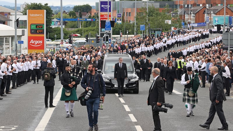 The funeral procession of senior Irish Republican and former leading IRA figure Bobby Storey following the funeral at St Agnes' Church in west Belfast