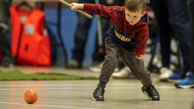 Charlie Wilkinson (5) who was born with Poland syndrome plays hurling at the limb loss sports day at the Olympia Leisure Centre. PICTURE: MAL MCCANN