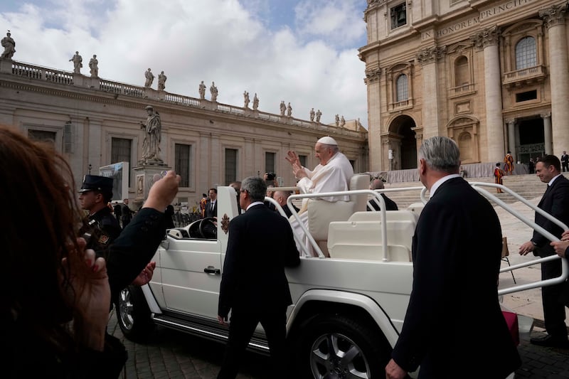 Pope Francis waves as he leaves after his weekly general audience in St Peter’s Square at The Vatican (Andrew Medichini/AP)