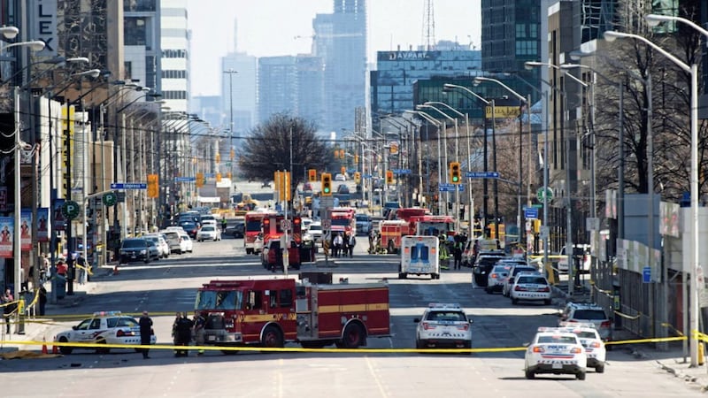 Emergency services close Yonge Street in Toronto after a van mounted a sidewalk crashing into a crowd of pedestrians on Monday. Picture by Nathan Denette/The Canadian Press via Associated Press. 