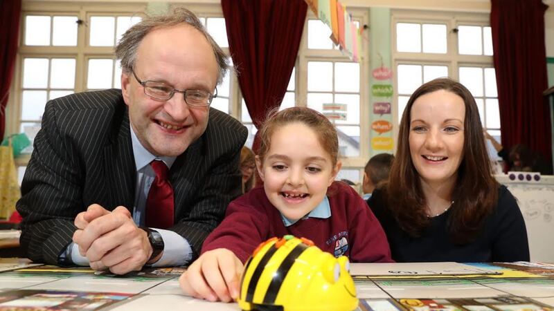 Education Minister Peter Weir with Nicole Chrapkowski, a P2 pupil from Fane Street Primary School in Belfast, and Mairead Meyer, managing director of Networks at BT in Northern Ireland at the launch of the Barefoot Computing Programme. Picture by William Cherry, Press Eye&nbsp;