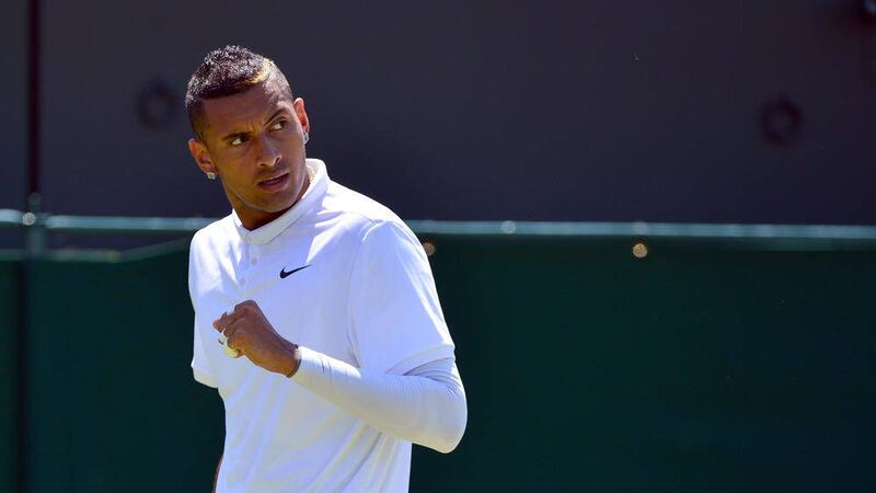 Nick Kyrgios celebrates a point against Milos Raonic during day Five of the Wimbledon Championships at the All England Lawn Tennis and Croquet Club, Wimbledon 