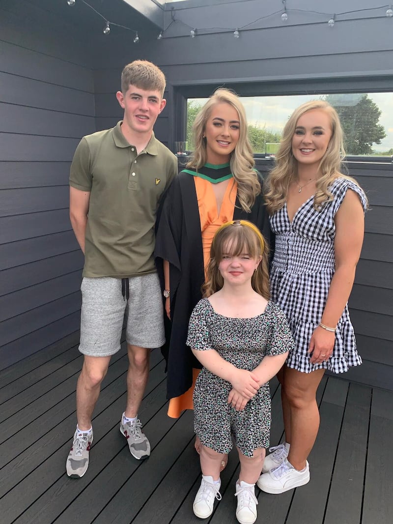 Maria Scullion pictured on her sister Emma's graduation, alongside her brother Eoin and sister Laura