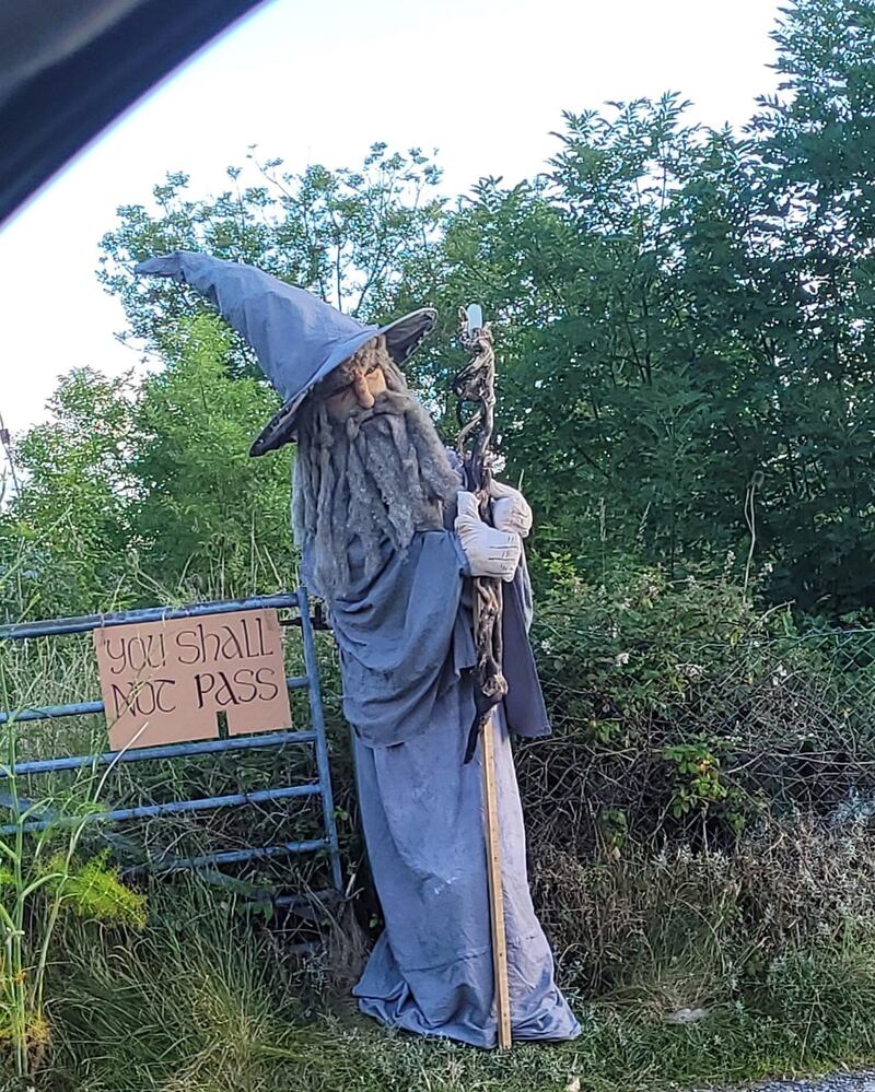 A scarecrow figure of Gandalf from Lord of the Rings