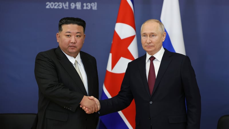 Russian President Vladimir Putin, right, and North Korean leader Kim Jong Un shake hands during their meeting at the Vostochny cosmodrome outside the city of Tsiolkovsky last year (Vladimir Smirnov/AP)