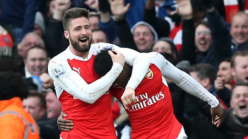 Arsenal's Danny&nbsp;Welbeck&nbsp;(right) celebrates scoring a stoppage-time winner against Leicester with teammate Olivier Giroud at the Emirates Stadium