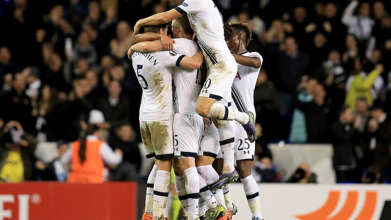 Mousa Dembele is mobbed by his Tottenham team-mates after scoring a late winner against Anderlecht on Thursday<br />Picture: PA