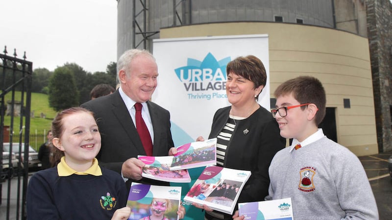 First and Deputy First Ministers, Arlene Foster and Martin McGuinness were in Derry&#39;s Bogside yesterday to launch the new Urban Villages. They are pictured with Eva McDaid from Gaelscoil Eadain Mhoir and Sam Hughes from the Fountain Primary School. Picture: Margaret McLaughlin.  