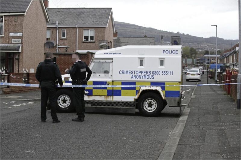 Police at the scene in Etna Drive in Ardoyne where Robbie Lawlor was shot dead. Picture by Hugh Russell. 