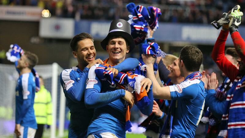 The Rangers players celebrate their promotion to the SPL on Tuesday night &nbsp;