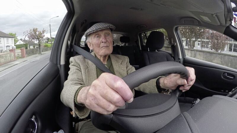 101-year-old John Walsh drives his electric car  