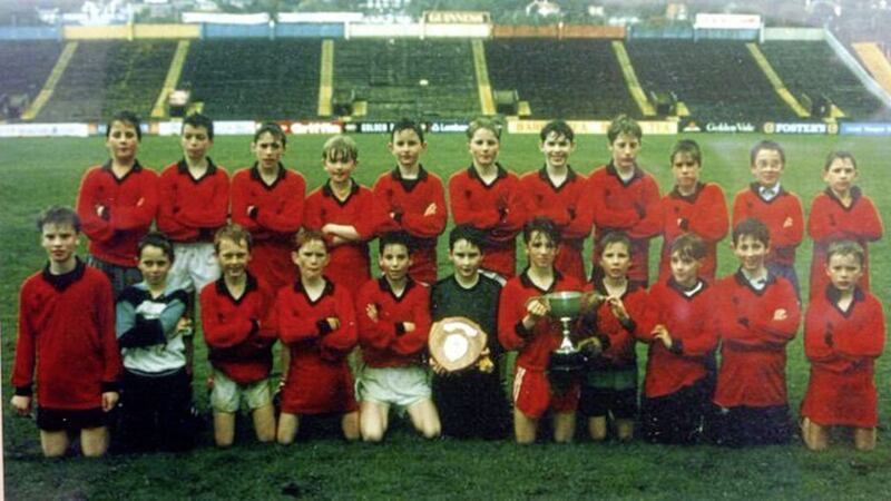 Liam Miller, who played for Eire Og GAC in Cork, pictured at P&aacute;irc U&iacute; Chaoimh holding a trophy with team mates. Picture via social media 