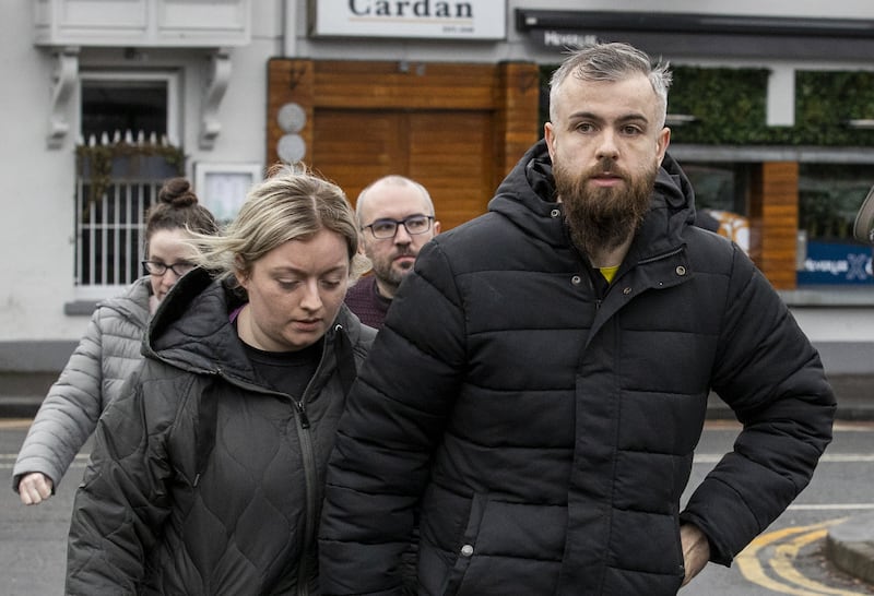 Natalie McNally's brothers Niall (right) and Brendan (behind) arrive at Lisburn Courthouse, where Stephen McCullagh, 32, from Woodland Gardens, Lisburn, has been remanded in custody after appearing in Lisburn Magistrates' Court over the murder of the 32-year-old in Lurgan in December.
