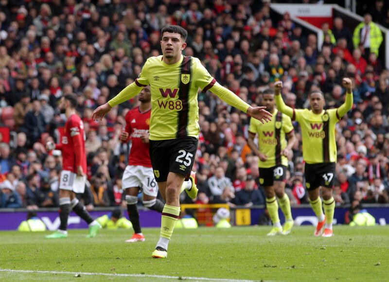 Burnley earned a valuable point at Old Trafford in their battle against relegation