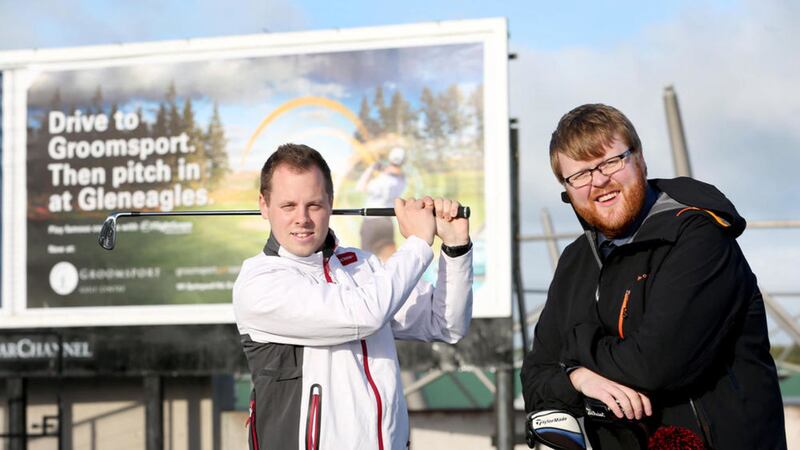 Pictured with the winning advertising campaign from Danske Bank&rsquo;s Marketing Boost competition are Gareth Graham from at Groomsport Golf Centre and Nick Craig from Danske Bank. Photo: Matt Mackey / Press Eye 